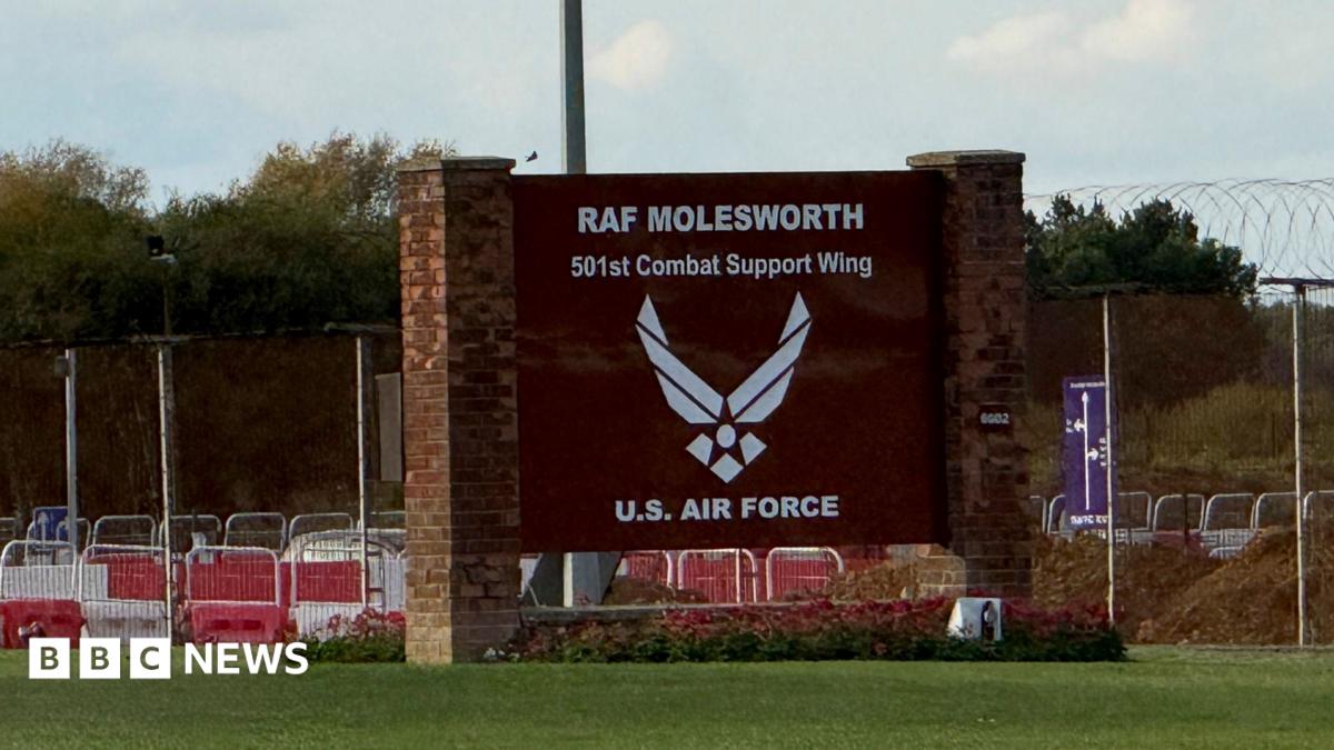 Two men arrested on suspicion of unauthorised access to an RAF base in Cambridgeshire